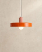 Orange pendant light with pink holder