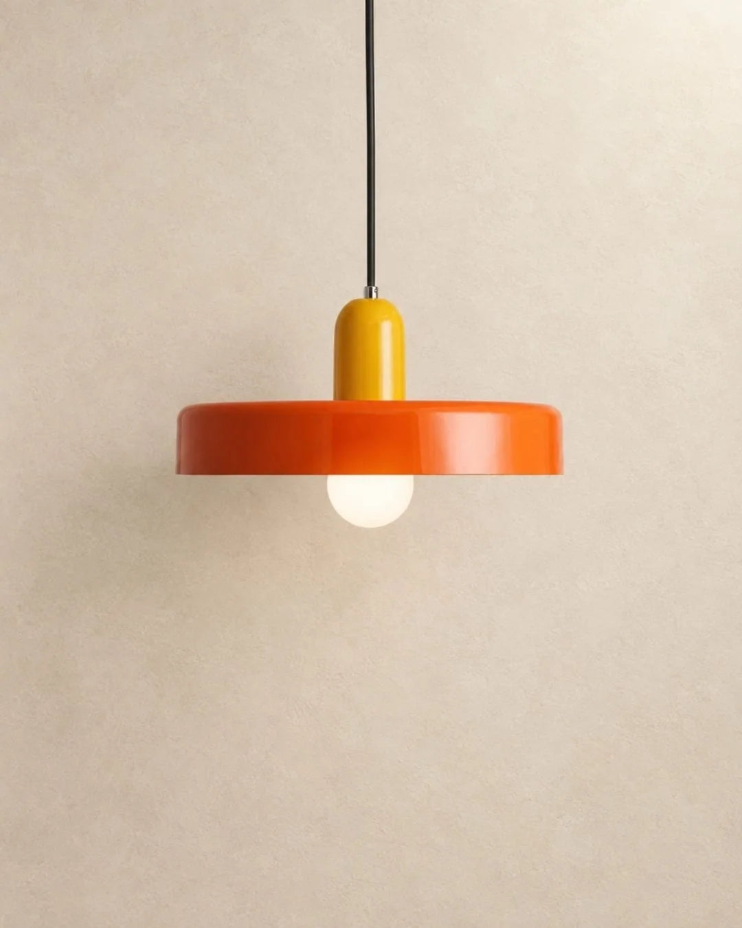 Orange pendant light with yellow holder