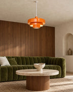 Orange tiered pendant light in living room