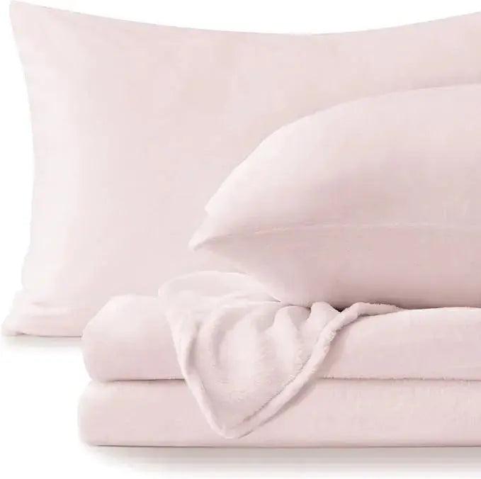 Pale pink fleece sheet set folded