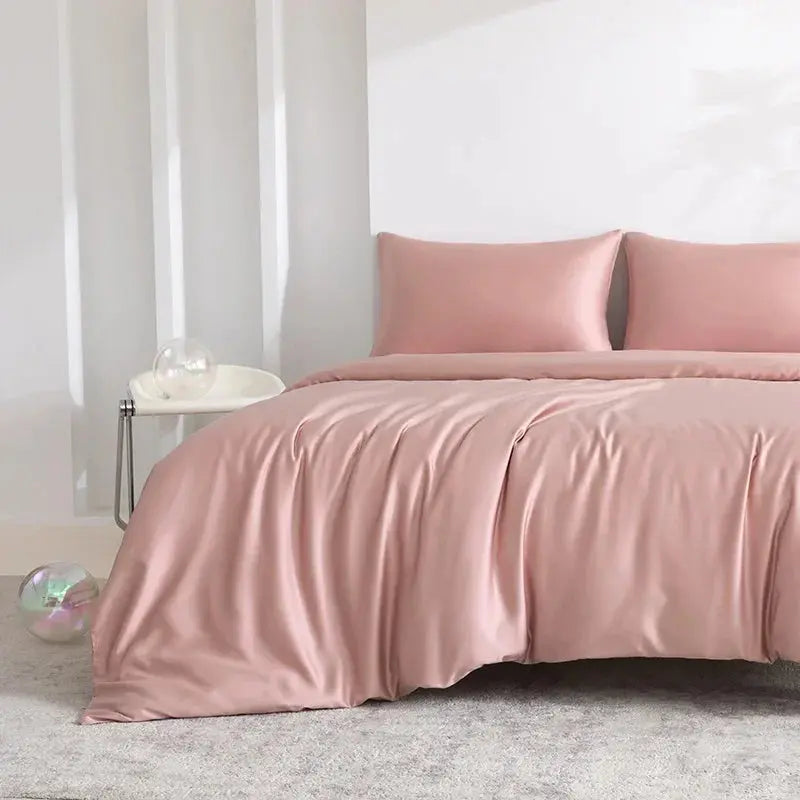Pink bamboo sheet set on bed