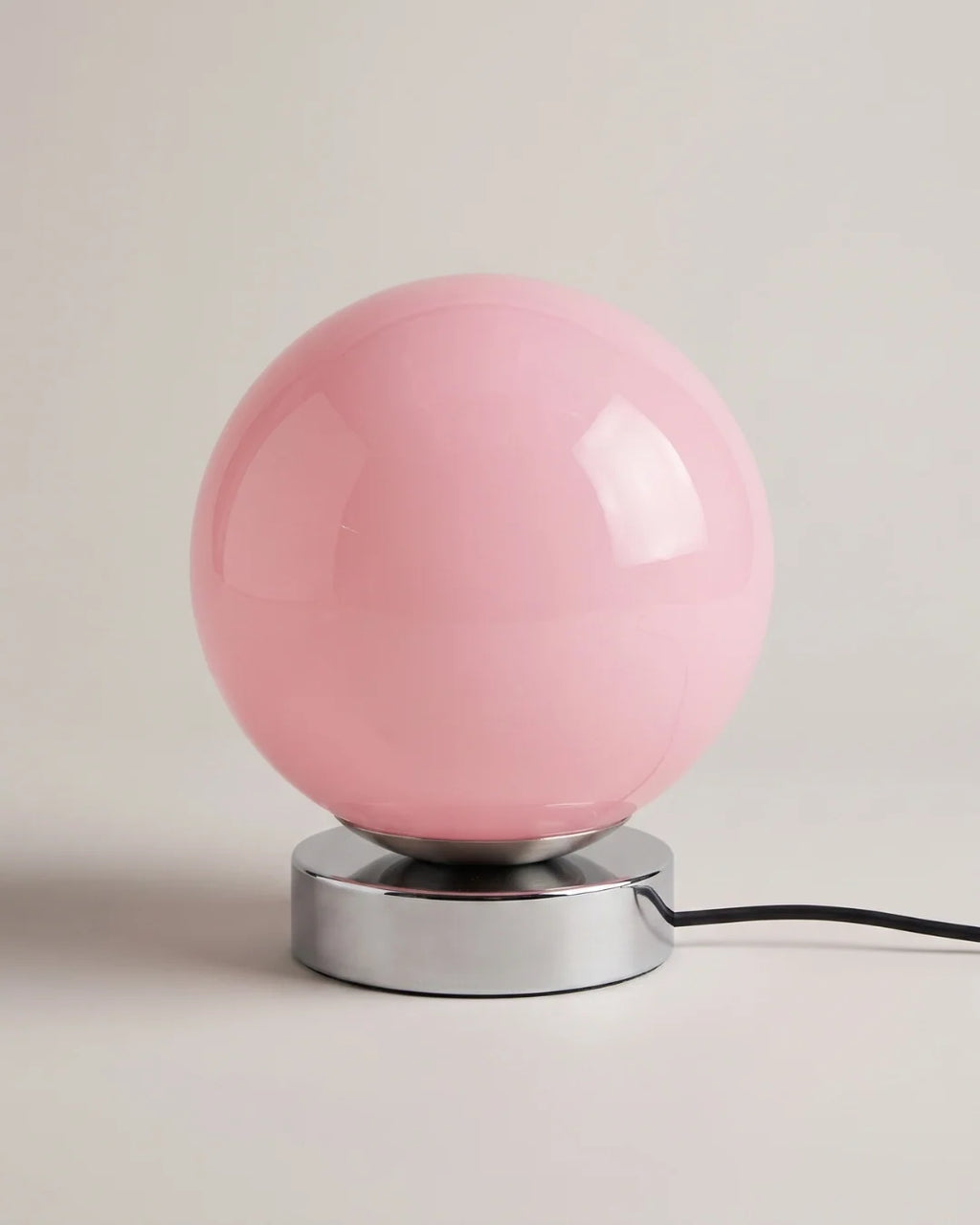 Pink glass globe table lamp