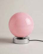 Pink glass globe table lamp