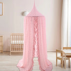 Pink hanging canopy in kids room