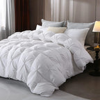 Plush white pinch pleat comforter in bedroom