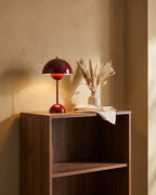 Red dome lamp on console