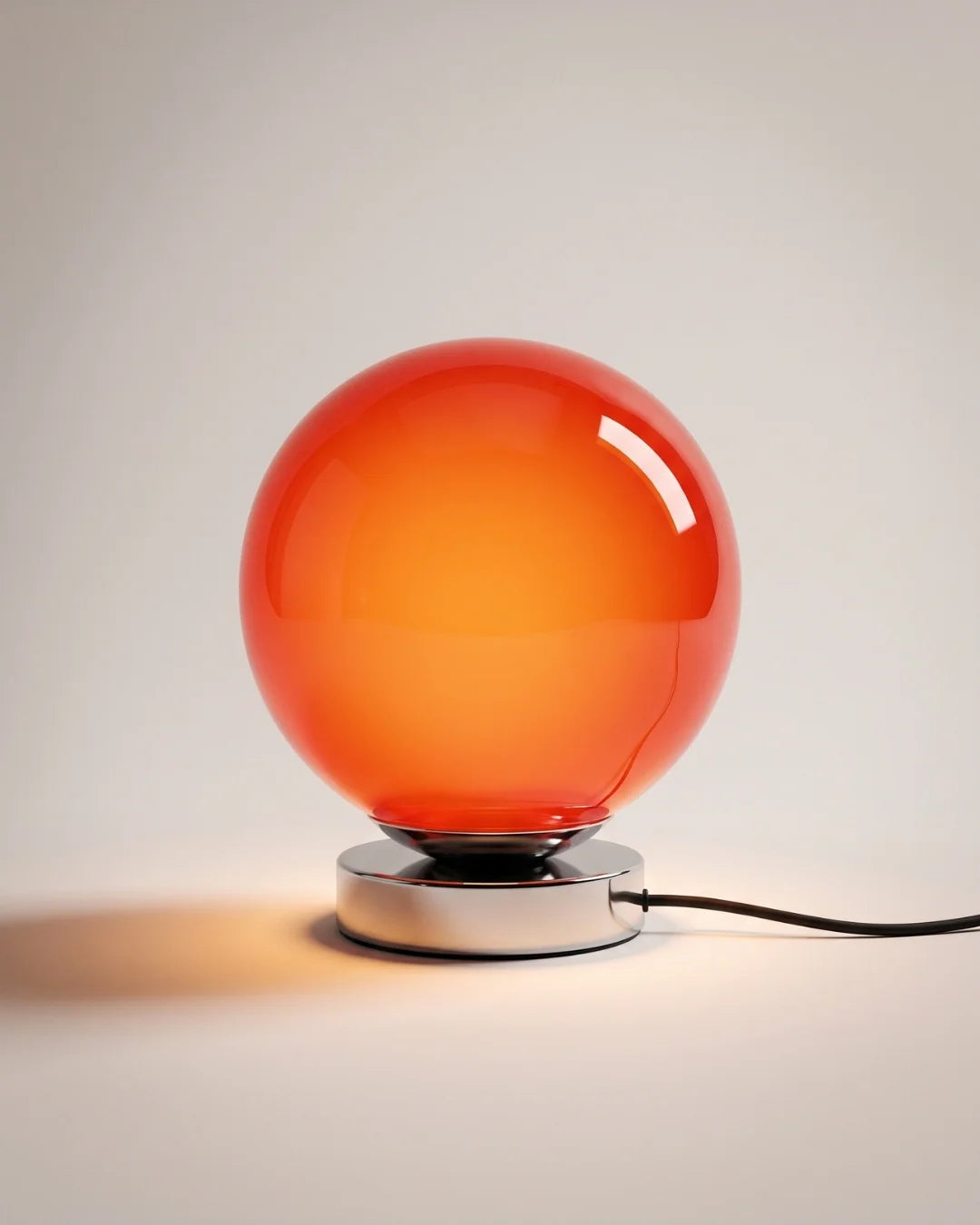 Red glass globe table lamp