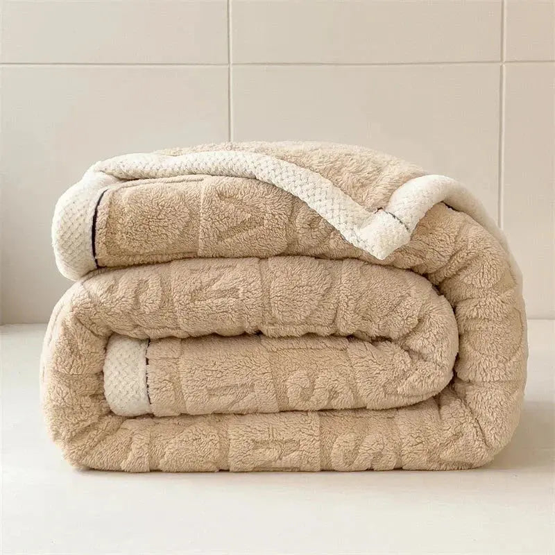 Rolled camel embossed fleece blanket