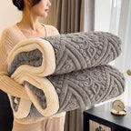 Rolled gray embossed sherpa blanket