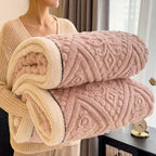 Rolled pink embossed sherpa blanket