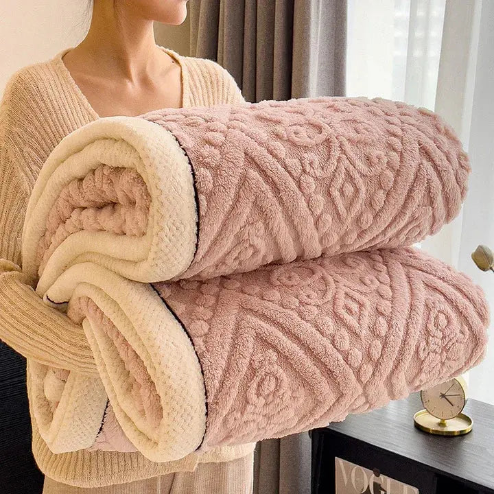 Rolled pink embossed sherpa blanket