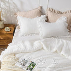 Ruffled pillowcases on white bedding