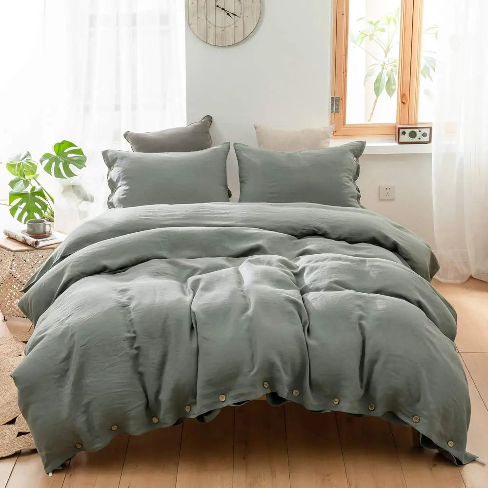 Sage gray cotton duvet cover set on bed