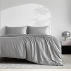 Silver gray bamboo sheet set on bed