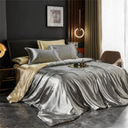 Silver gray satin bedding set on bed