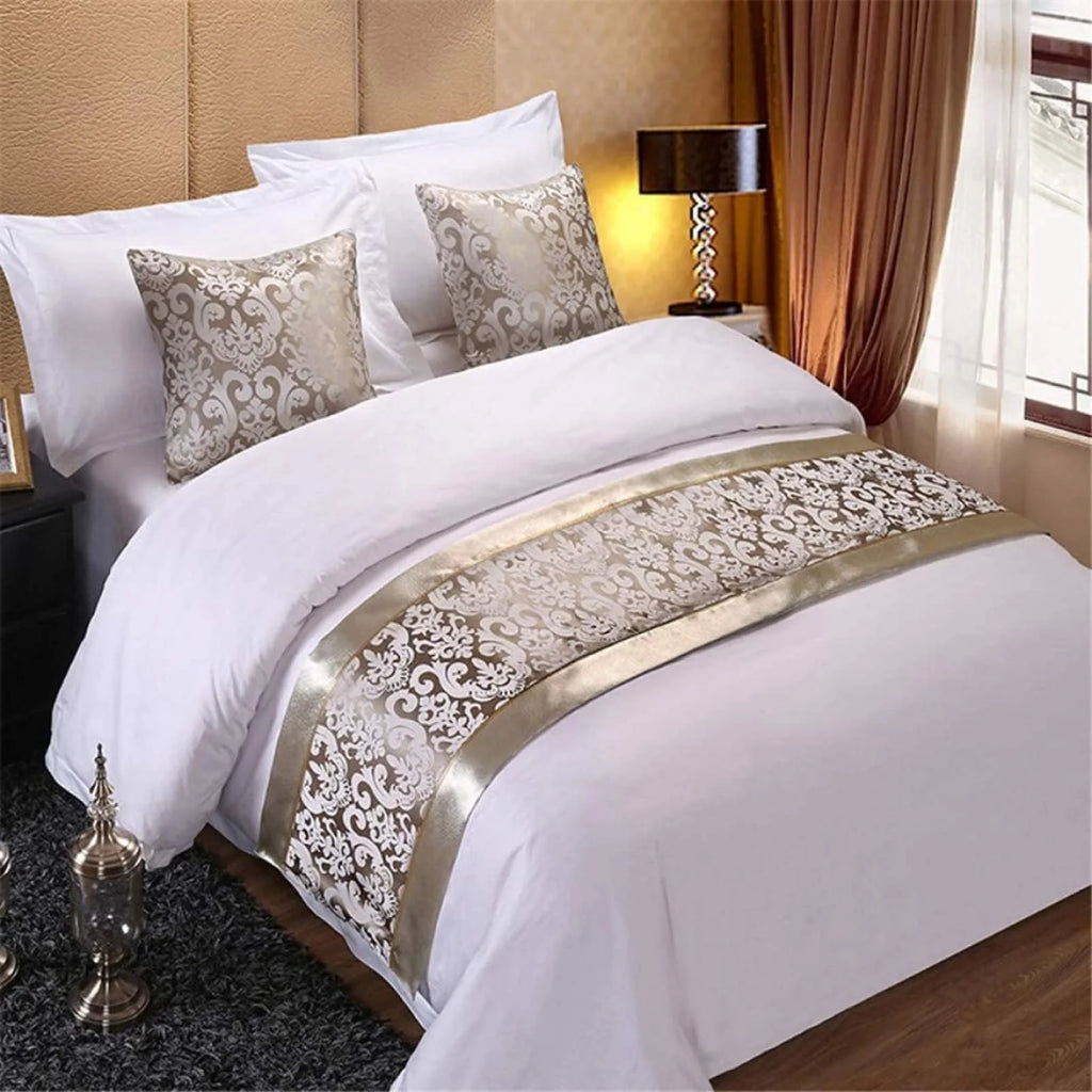 Silver jacquard bed runner on bed