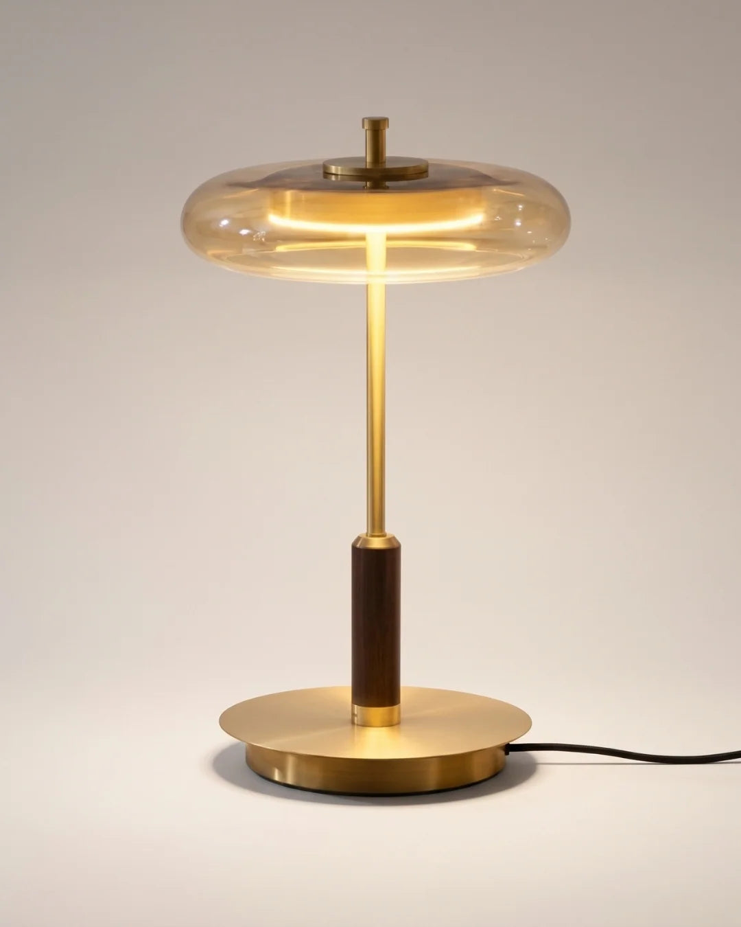Smoked glass and brass table lamp