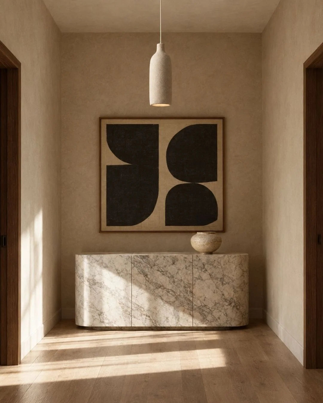 Textured pendant light in entryway
