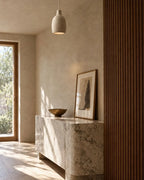 Textured pendant light in hallway
