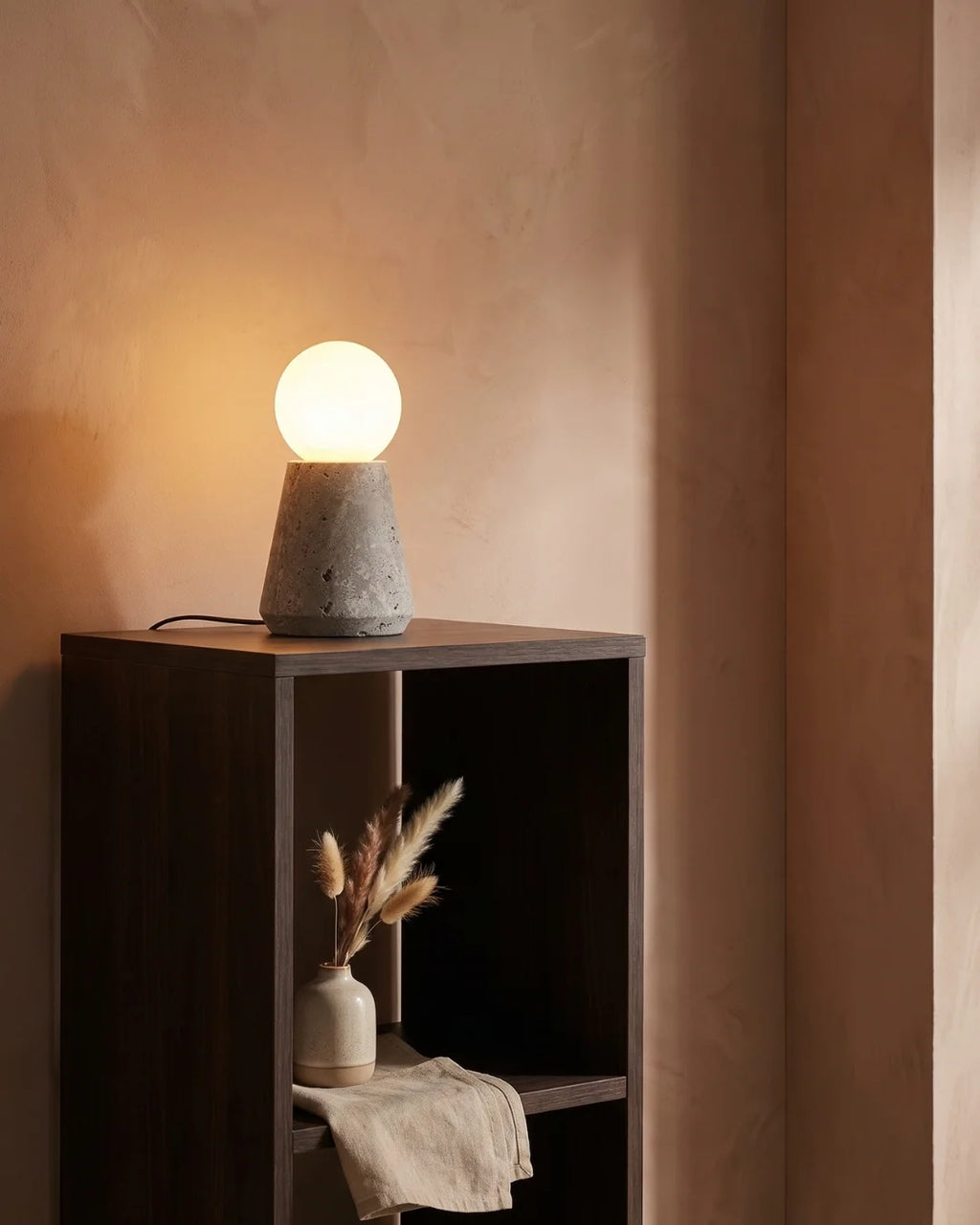 Travertine lamp on bookshelf
