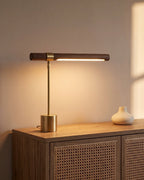 Walnut LED desk lamp lit from the side