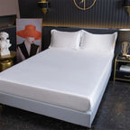 White bamboo fitted sheet on bed
