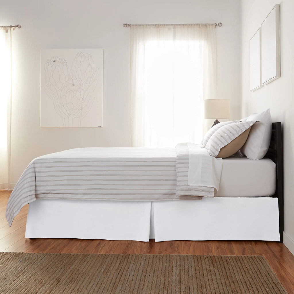 White bed skirt in bedroom