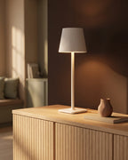 White cordless lamp on sideboard