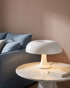 White mushroom lamp on side table