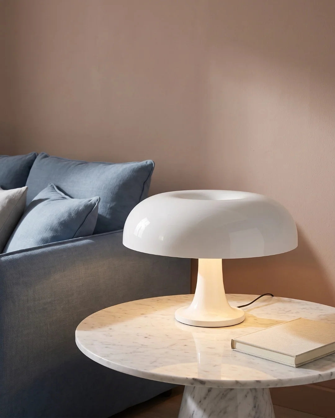 White mushroom lamp on side table