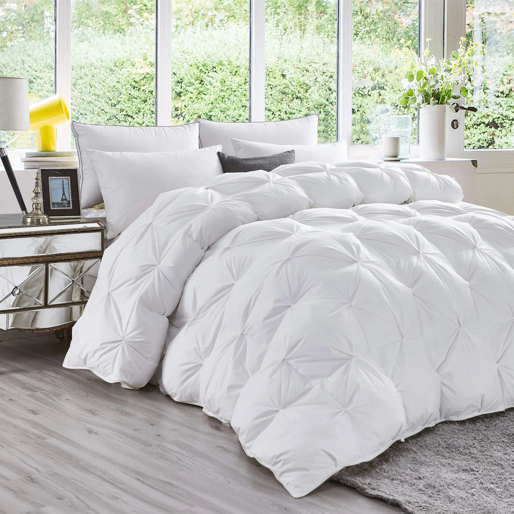 White pinch pleat comforter in bright bedroom
