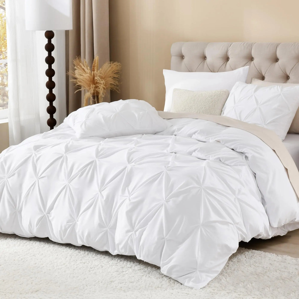 White pinch pleat duvet cover in bedroom