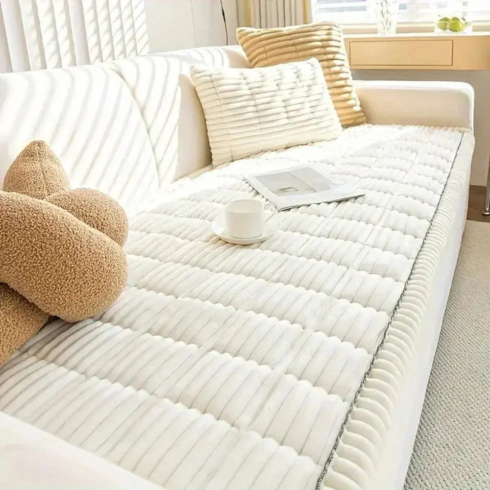 White plush couch cushion cover on sofa