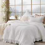 White ruffled bedding in bright bedroom