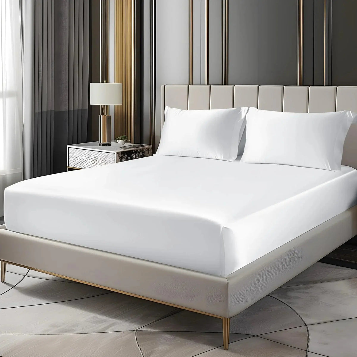White satin fitted sheet set on bed