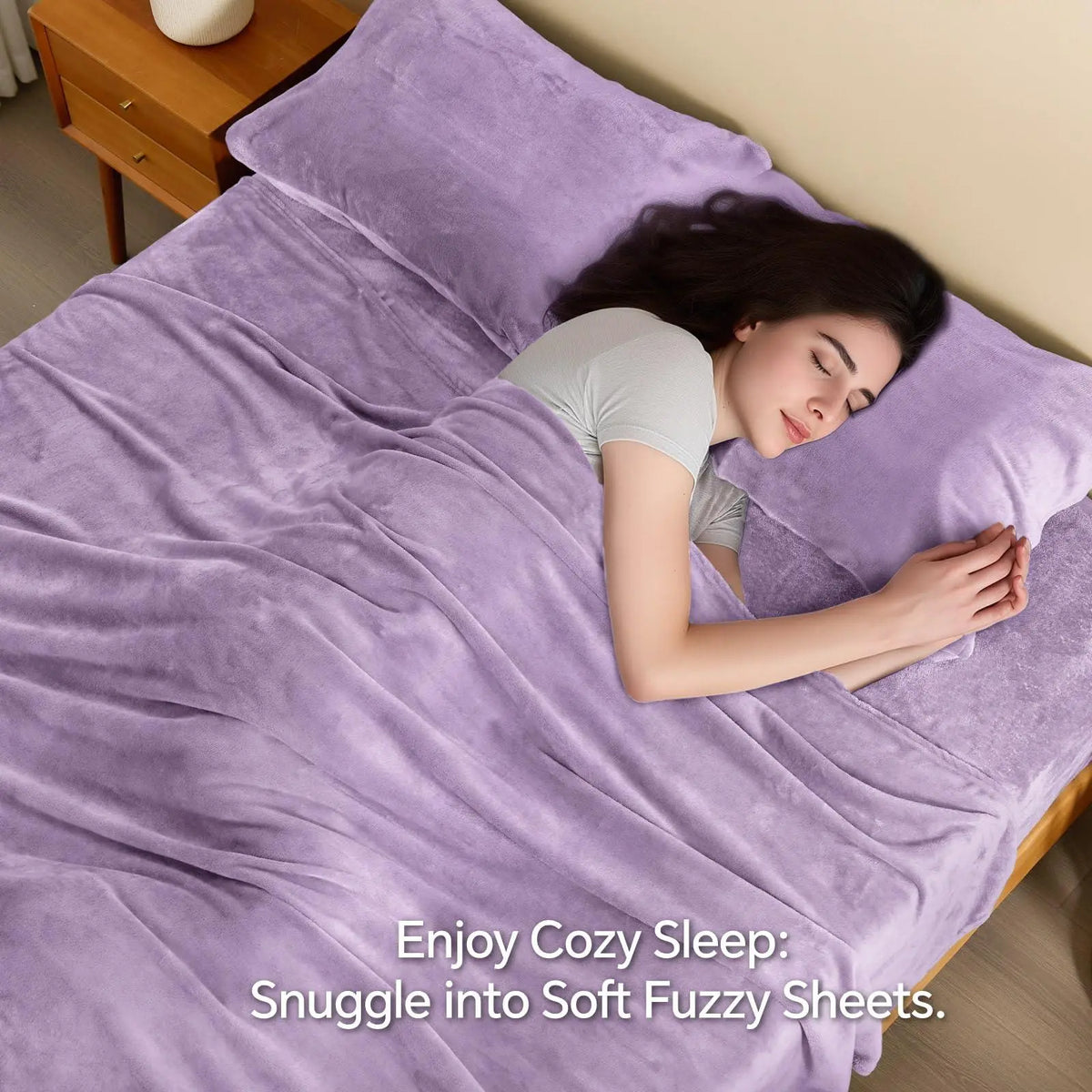 Woman sleeping on soft purple fleece sheets