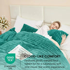 Woman sleeping under plush turquoise fleece duvet cover