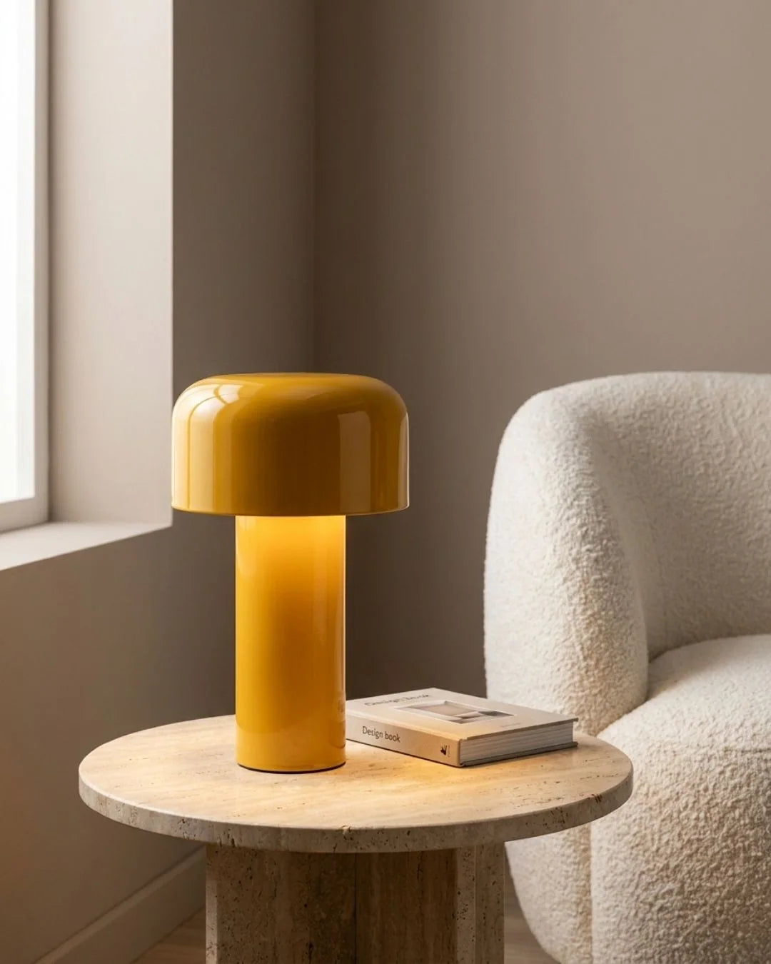 Yellow cordless lamp on side table