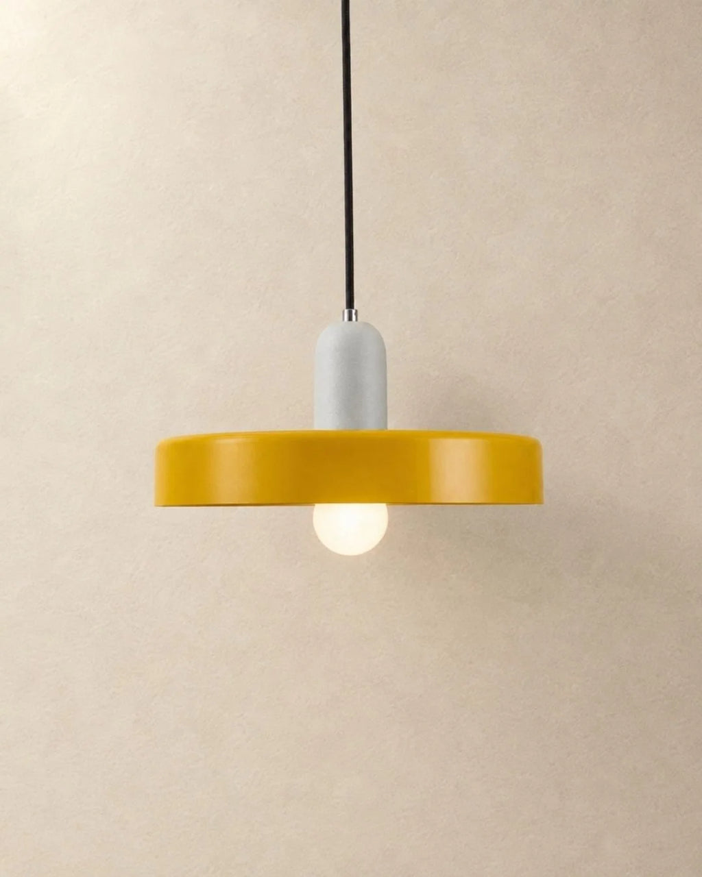 Yellow pendant light with white holder