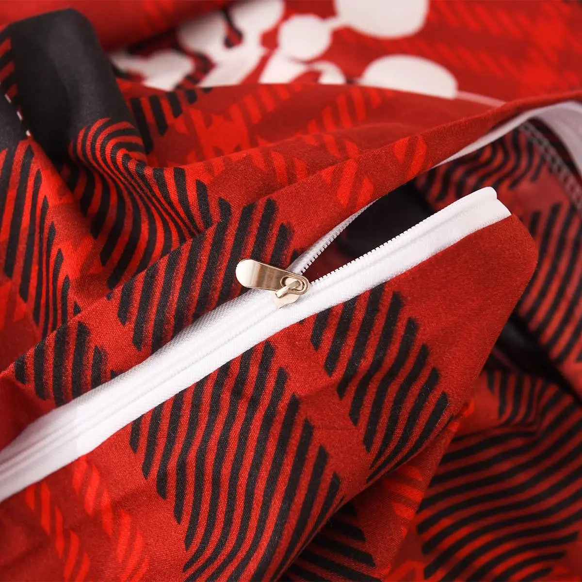 Zipper closure on red plaid duvet cover