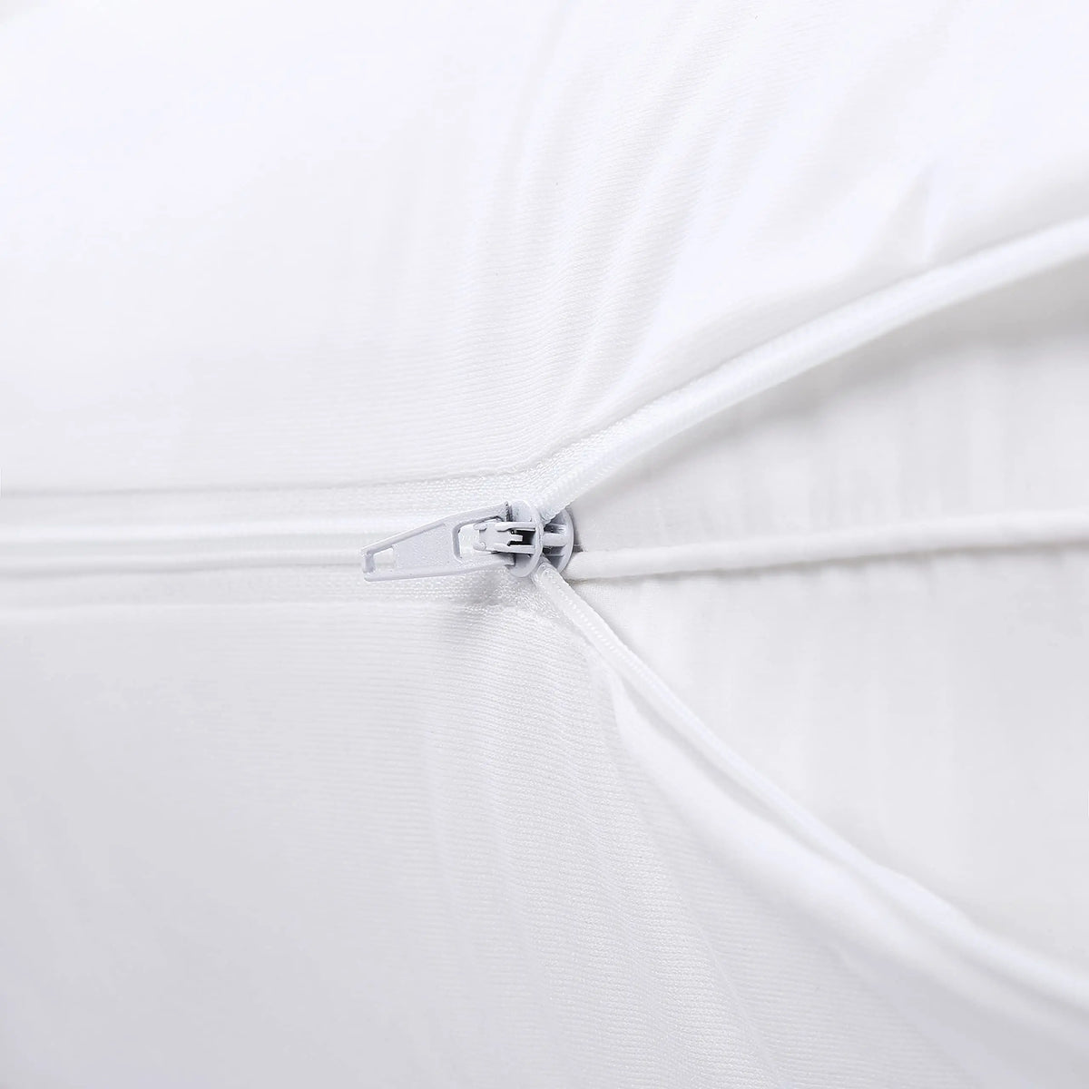Zipper detail on white pillow protector